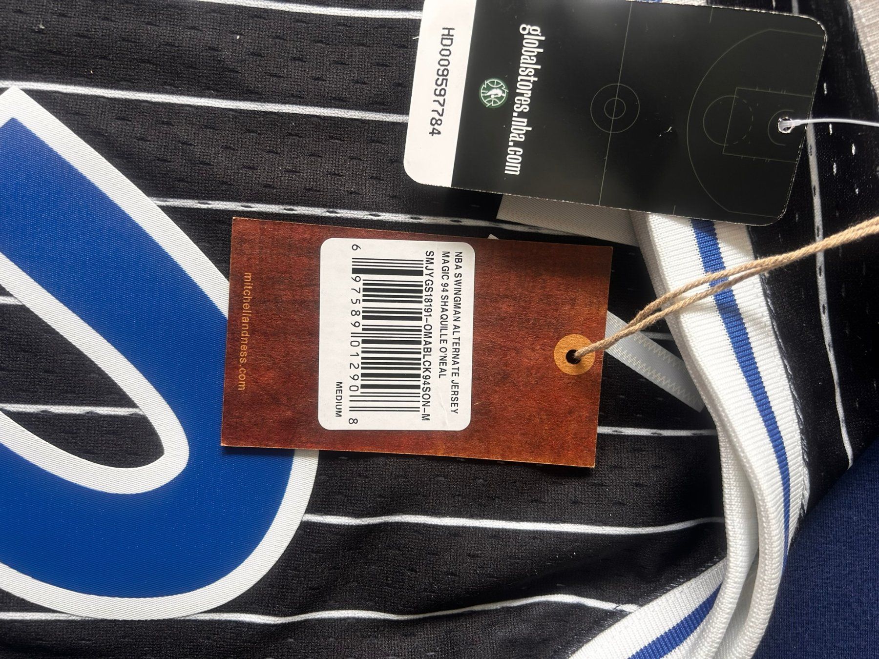 Mitchell & Ness Leibchen & Hosen: ORLANDO MAGIC - Trikot schwarz neu Gr. M – Neu und originalverpackt aus Thalwil von Mbadzi 2
