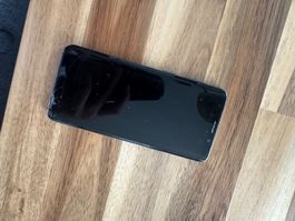 Smartphone Samsung Galaxy S9 mit Display- und Glasschaden