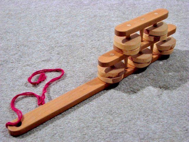 Rassel Klapper 7 Buchstaben