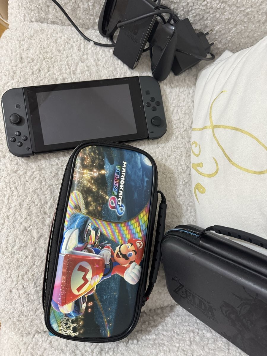 Nintendo Console: Nintendo Switch grise avec 15 jeux et accessoires – Usato da Brügg BE venduto da haj_9zhk 1