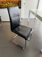 8 Freischwingerstühle, echtes Leder, schwarz