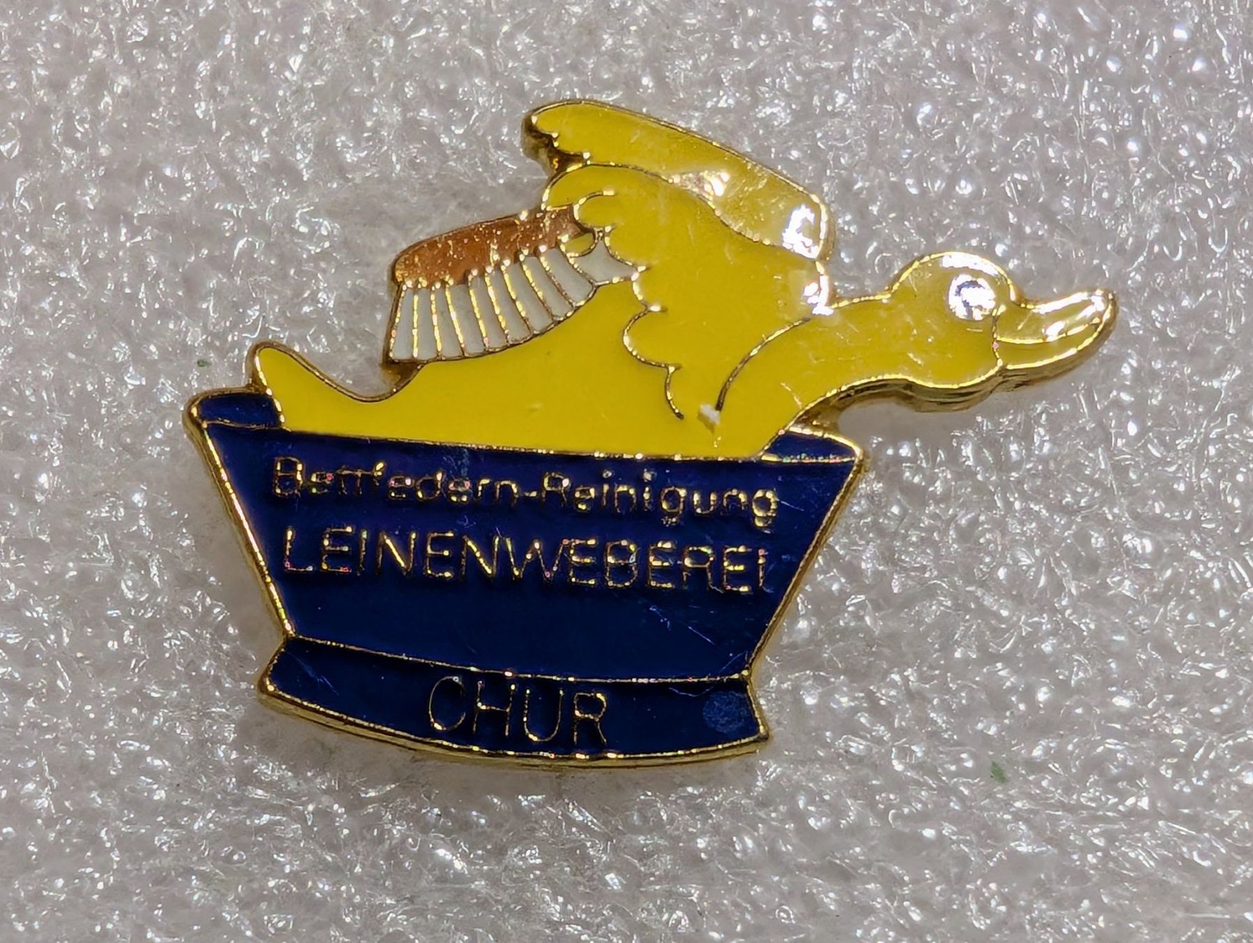 Placchette & Badge: Ansteckpin 281: Leinenweberei Chur – Usato da Oppligen venduto da Pin-Fall-Shop