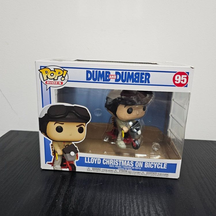 Funko Pop! Ride: Dumb & Dumber - Lloyd Christmas Con Bicicletta