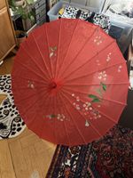 Red parasol / umbrella with painted flowers