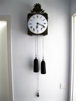 COMTOISER  UHR MIT  SONNENEMBLEM  UM  1800