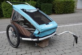Gefederter Veloanhänger Croozer für 2 Kinder hellblau