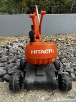 Spielzeugbagger Hitachi