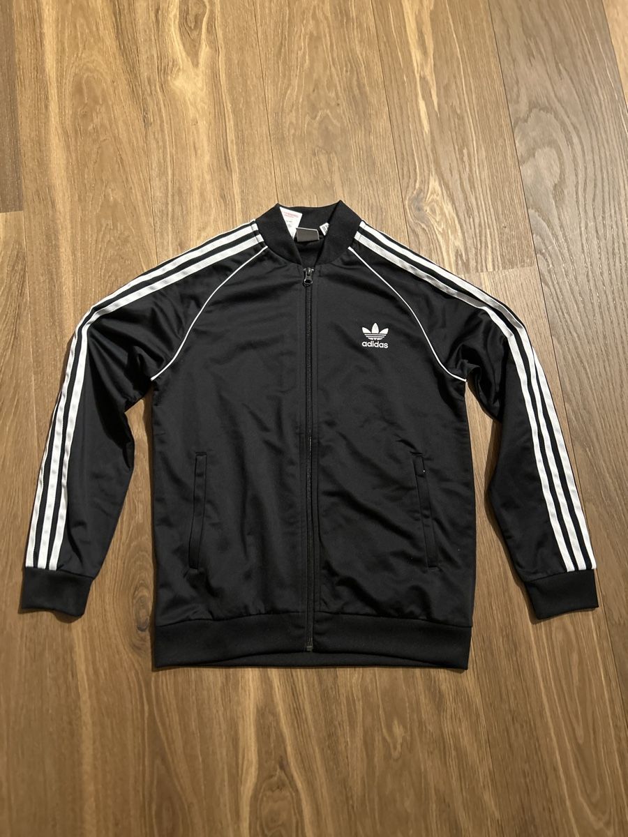 Giacche: Trainerjacke Adidas Schwarz Gr. 164 – Usato da Sempach venduto da Fambirrer
