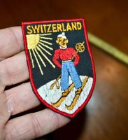 VINTAGE Badge SWITZERLAND nos ST. GALLER STICKEREI skifahrer