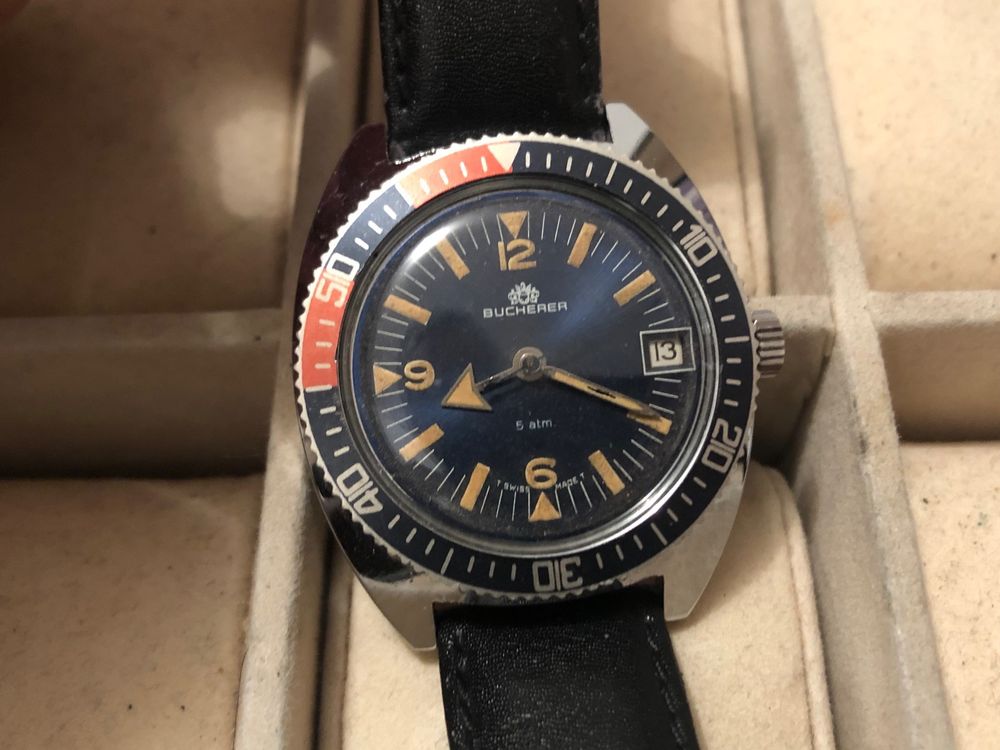 Montre Mécanique AFRICA PRIMA PRIMA 1960 - Cadran Argenté, Boîtier Plaqué Or, Bracelet Cuir Noir - Occasion Quasi Neuve
