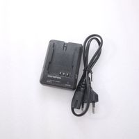 Olympus BCM-2 Ladegerät / chargeur / Charger. Original.