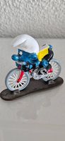 Schlumpf auf Fahrrad