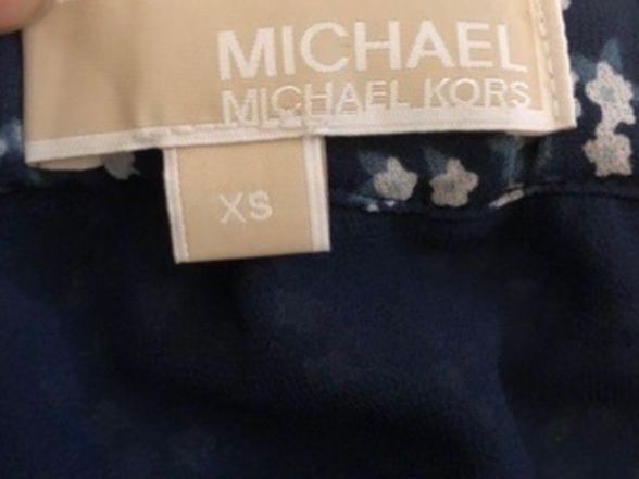 Michael Kors Gonne: Jupe midi à fleurs Michael Kors – Nuovo (secondo la descrizione) da Genève venduto da vic_s9c5 5