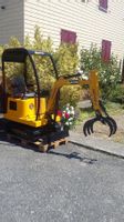 Bagger mit Greifer / Holzgreifer Kinderbagger mit Holzzange