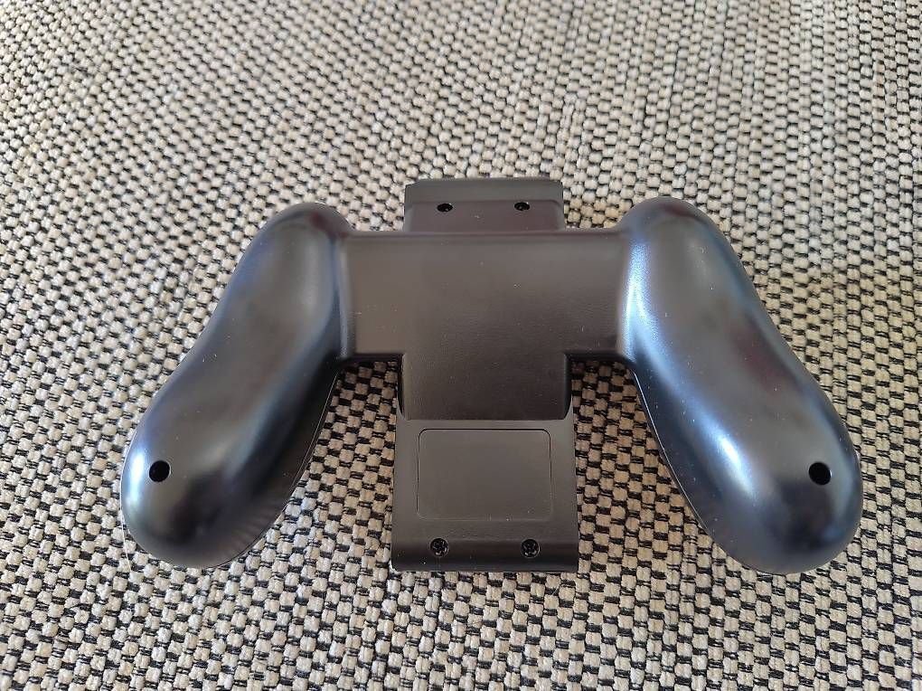 Controller: NEU: Grip für Nintendo Switch Joy Con – Nuovo e nell'imballaggio originale da Wohlen AG venduto da gnabbr 2
