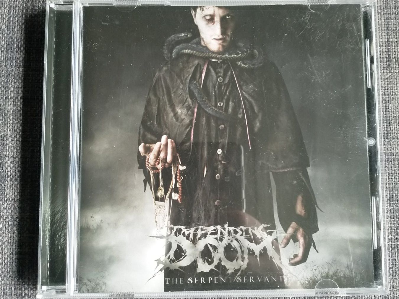 CD: Impending Doom - The Serpent Servant – Usato da Basel venduto da sim_qd8z