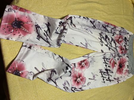 Pantaloni donna stampa floreale bianco rosa elastici
