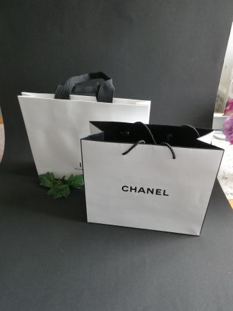 2 IWC Henkel-Tasche und Chanel-Tasche
