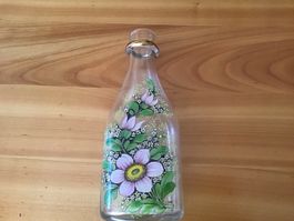 Bouteille décorée à la main motifs floraux verre 25cm bon ét