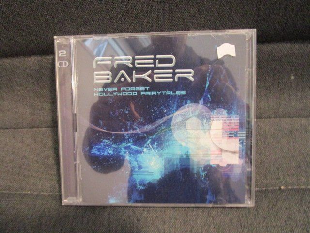 CDs: Fred Baker - Never forget Hollywood Fairytales CD – Gebraucht aus Olten von Disc-Ausverkauf