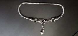 Bracelet jonc avec coeur breloque acier chromé 18-21cm
