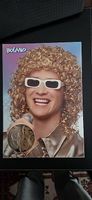Perruque blonde bouclée style Michel Polnareff 