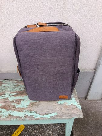 Rucksack Nordace grau mit Gebrauchsspuren, Defekt oben