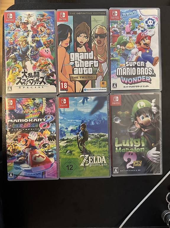 Nintendo Consoles: Nintendo Switch Lite Bundle + 7 Spiele + Reisetasche – D'occasion à Frenkendorf par BescheA 3
