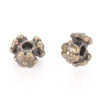 30 Rondellen Blume antik bronze 6.5x4mm