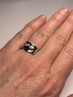 Bague élégante sertie d’un zircon étincelant