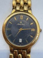 Montre Mathey-Tissot Vintage Quartz dorée