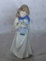 Lladró Porcelain figurine girl with doll great condition