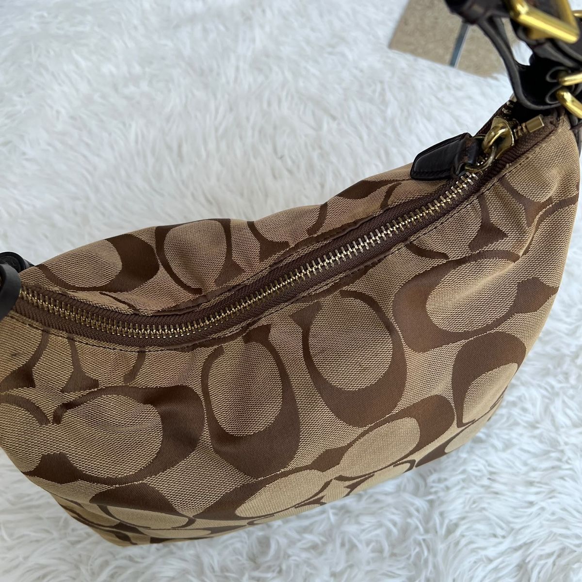 Coach Borse da donna: Coach Umhängetasche Monogramm braun Leder 36x28cm – Usato da Eggenwil venduto da CNSRVINTAGE 1