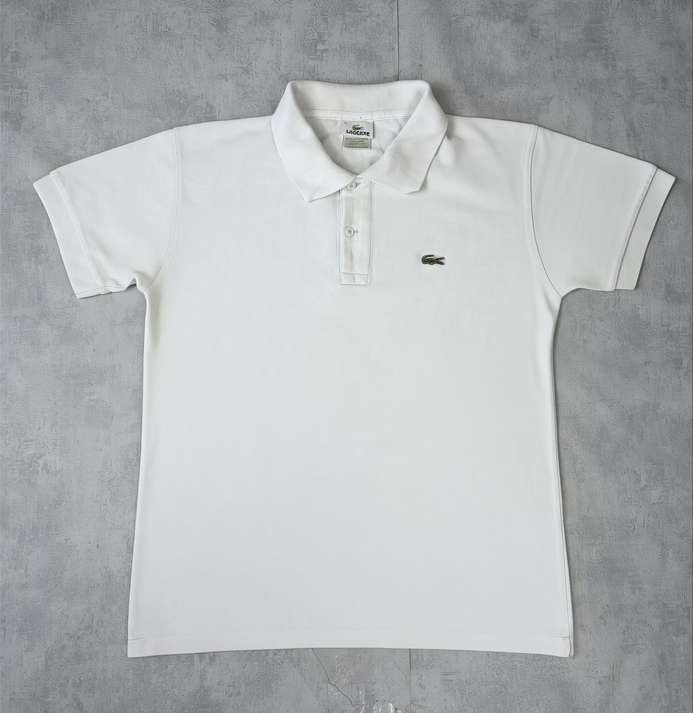 Lacoste Polos: Polo Lacoste Blanc Classique - L #9 – Neuf (Voir description) à Hauterive NE par Leo_o