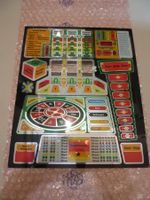 Scheibe zu einem Spielautomaten  Frosch-Derby