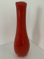 Vase rouge en verre