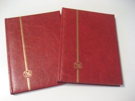2 Briefmarkeneinsteckbücher, schwarze Seiten, Occasion
