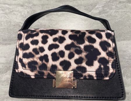 Borsa a mano animalier nera usata in buone condizioni