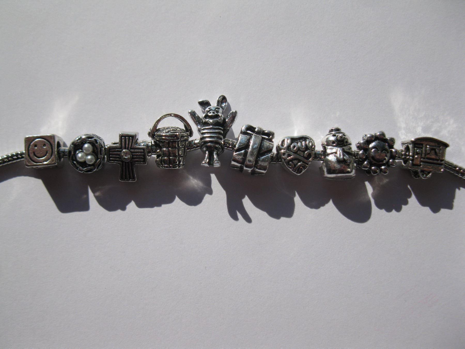 Perle (finte): 10 Metallperlen, Beads, Grosslochperlen mit Motiv – Nuovo e nell'imballaggio originale da St. Margarethen TG venduto da LuanaKa 1