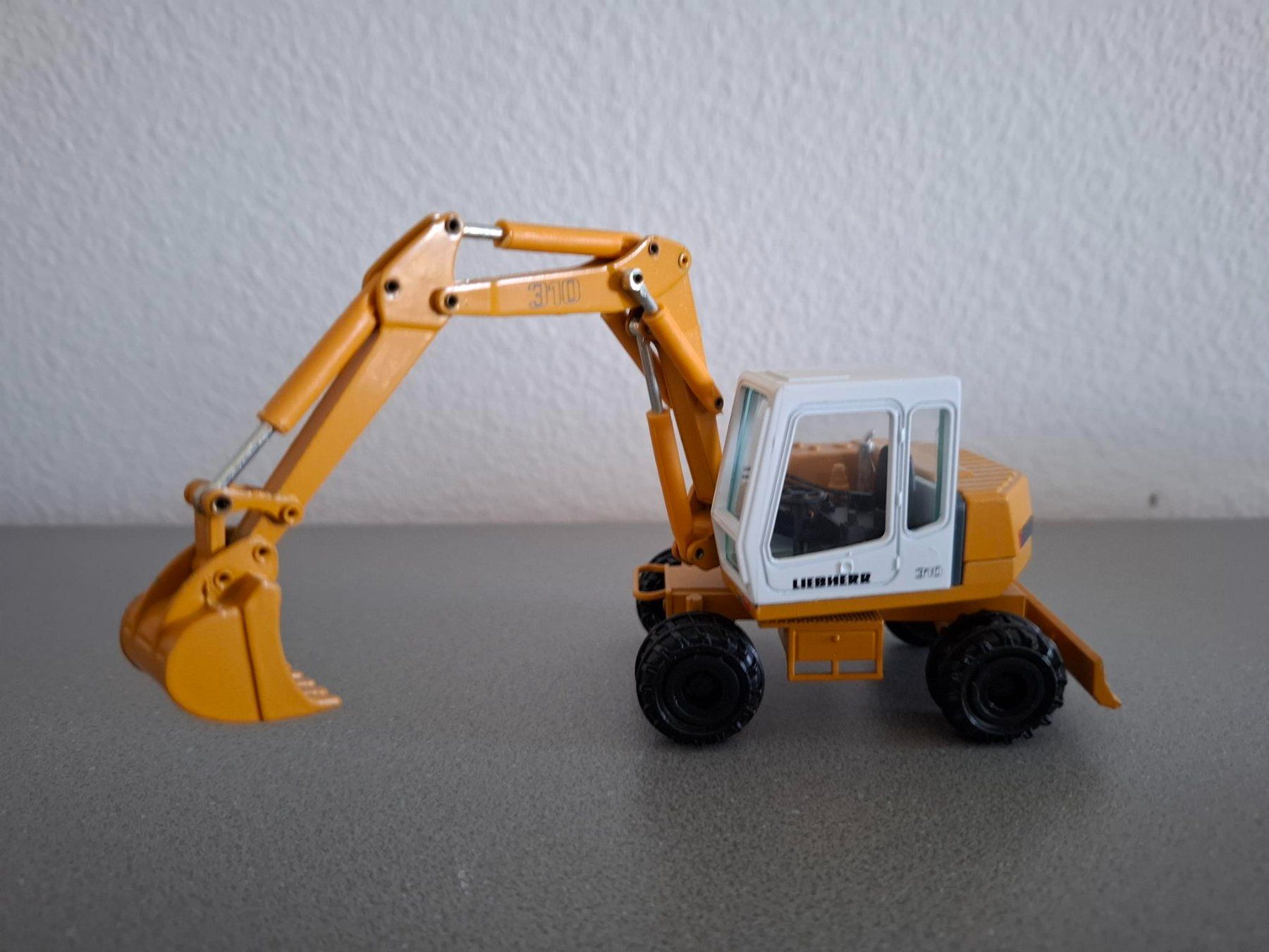 Conrad Kit di modellismo & Modellini statici: Conrad Liebherr Hydraulikbagger A 310 1:50 – Nuovo (secondo la descrizione) da Henau venduto da fag_lzx9 2