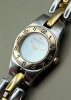 Baume & Mercier Bicolor mit Perlmutt Zifferblatt