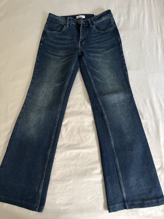 Jean Famous bleu foncé coupe évasée taille S neuf