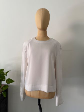 H&M Bluse creme mit Schulterpolstern – Gr. M