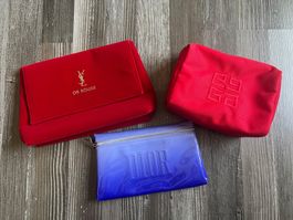 Plusieurs trousse de toilette marque
