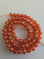 Zirkon Orange facettiert ca. 6mm. Strang