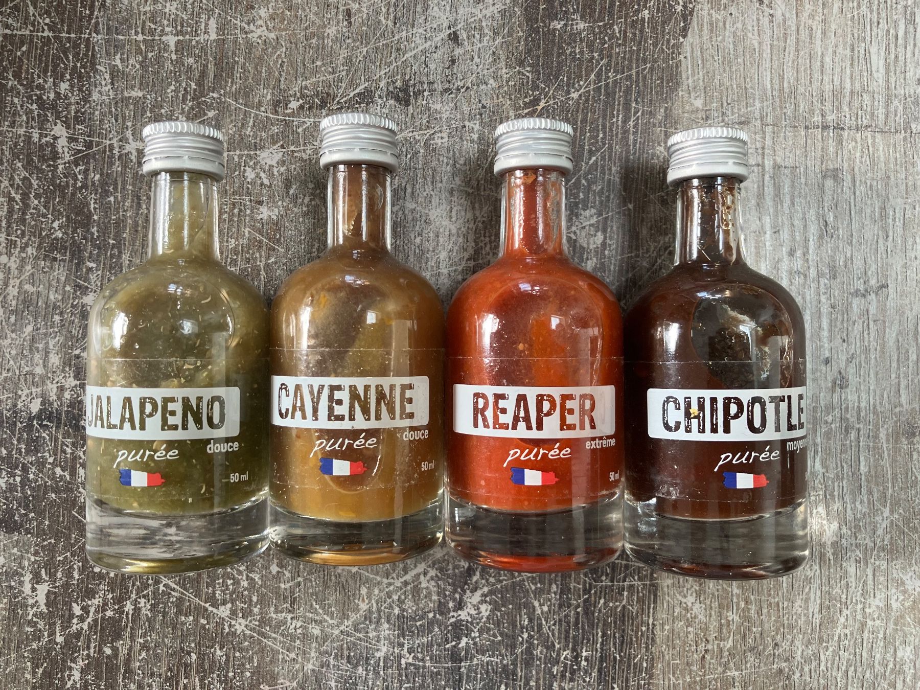 Aliments & Spécialités: 4 sauces pimentées Hellicious – Neuf (Voir description) à Estavayer-le-Lac par max_14