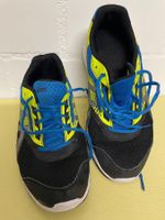 Asics Laufschuhe Modell Rapid gebraucht schwarz blau