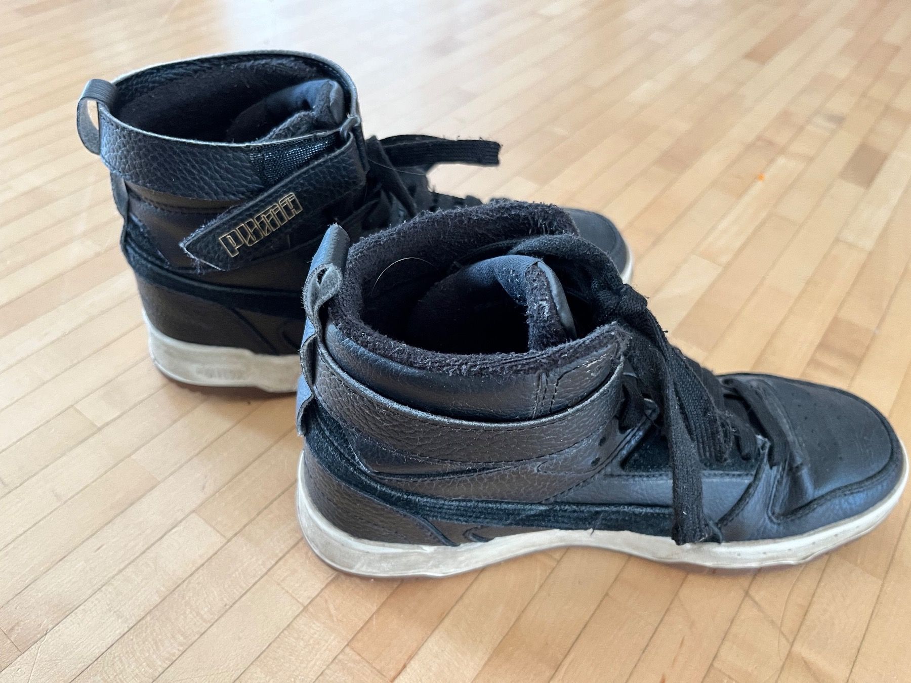Puma Scarpe per ragazzi: Schwarze Puma Sneaker, Gr. 38 hoch – Usato da Horgen venduto da Hoppelhase11 1