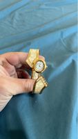 Elegante Vintage Armbanduhr, goldfarben mit Strasssteinen