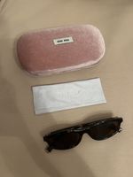 Lunettes de soleil Miu Miu écaille bon état avec boîte